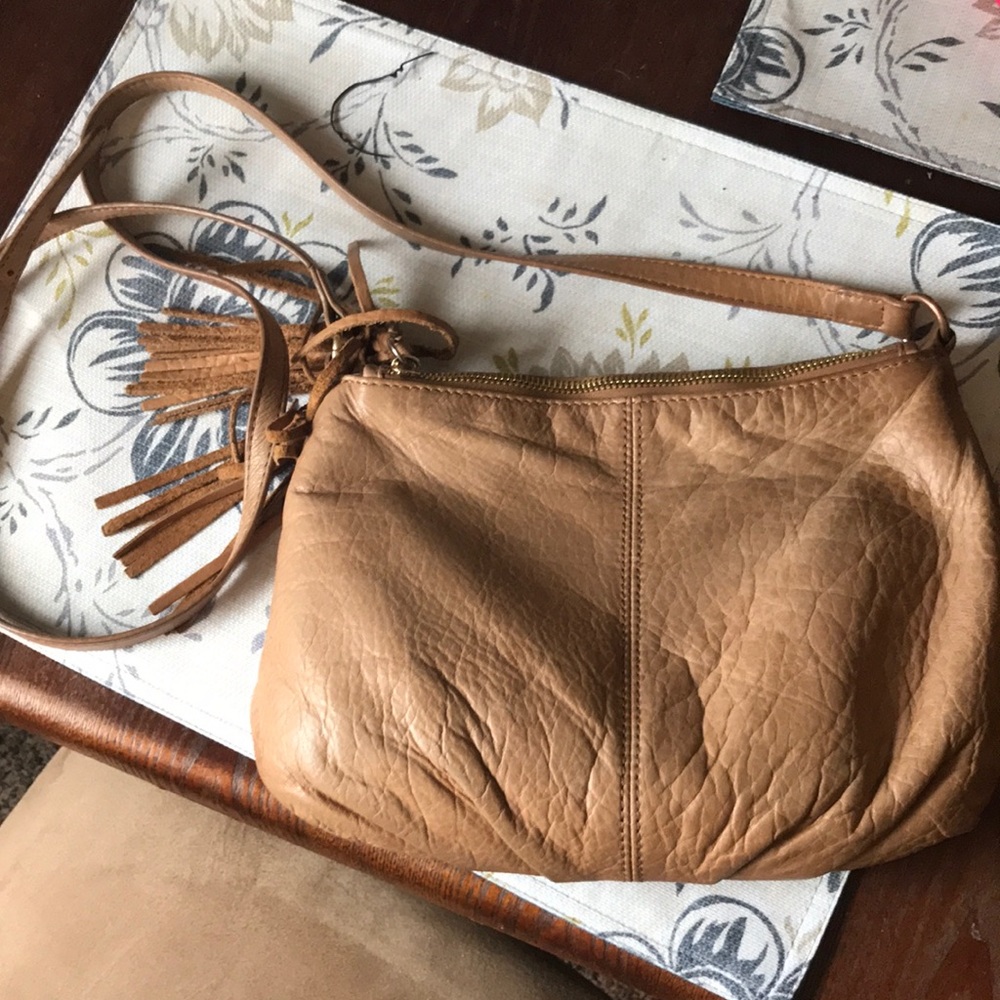 Genuine leather crossbody purse with tassels !